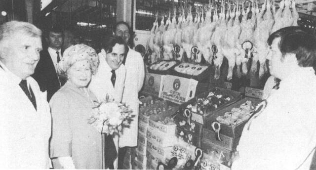 The Queen Mother inspecting Welford poultry products when she visited Smithfield Market, 1982