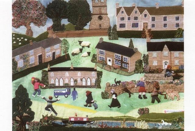 Kristin's village scene – from a collage in fabric and embroidery