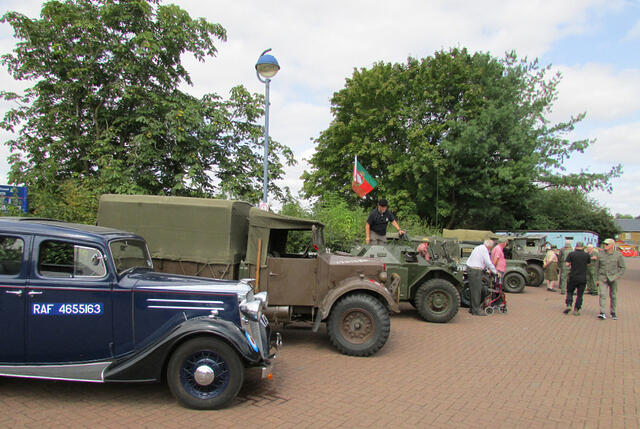 Vehicles lined up in the car park of the Windmill Centre