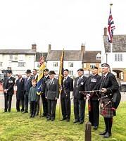 County and Deddington Branch Royal British Legion officers and Standard Bearers (one with his cub scout grandson) and Piper Stewart Carnegie