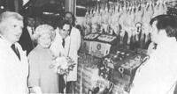 The Queen Mother inspecting Welford poultry products when she visited Smithfield Market, 1982