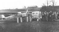 A customer picking up his chicks in an Austerclub airplane