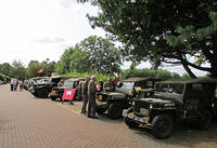 Vehicles lined up in the car park of the Windmill Centre